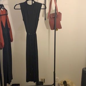 Black pleated sleeveless high neck dress